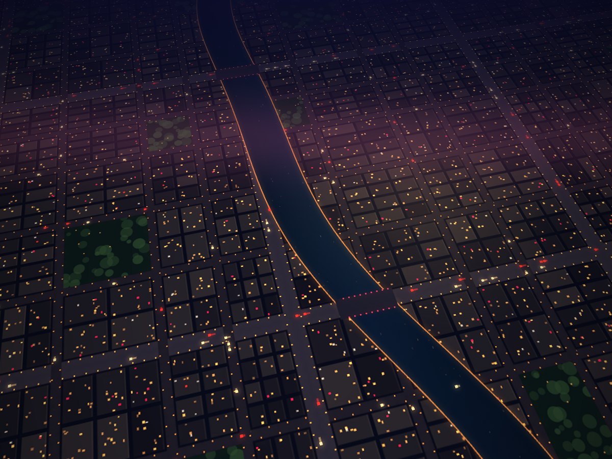A night city with a river and bridges seen from above in golden light