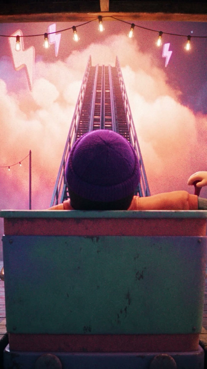 Puffin in the front car facing the lift hill into pink clouds