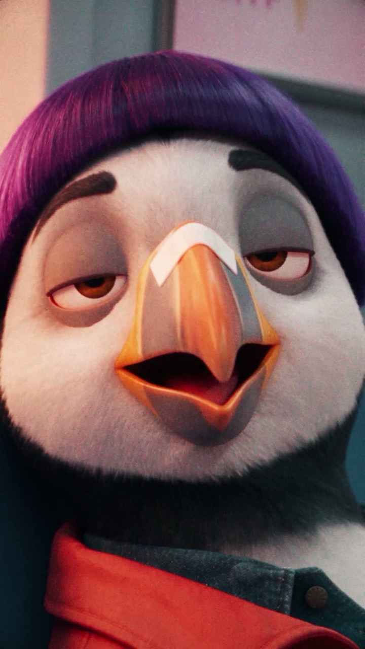 Close-up of Puffin smiling with his eyes half closed