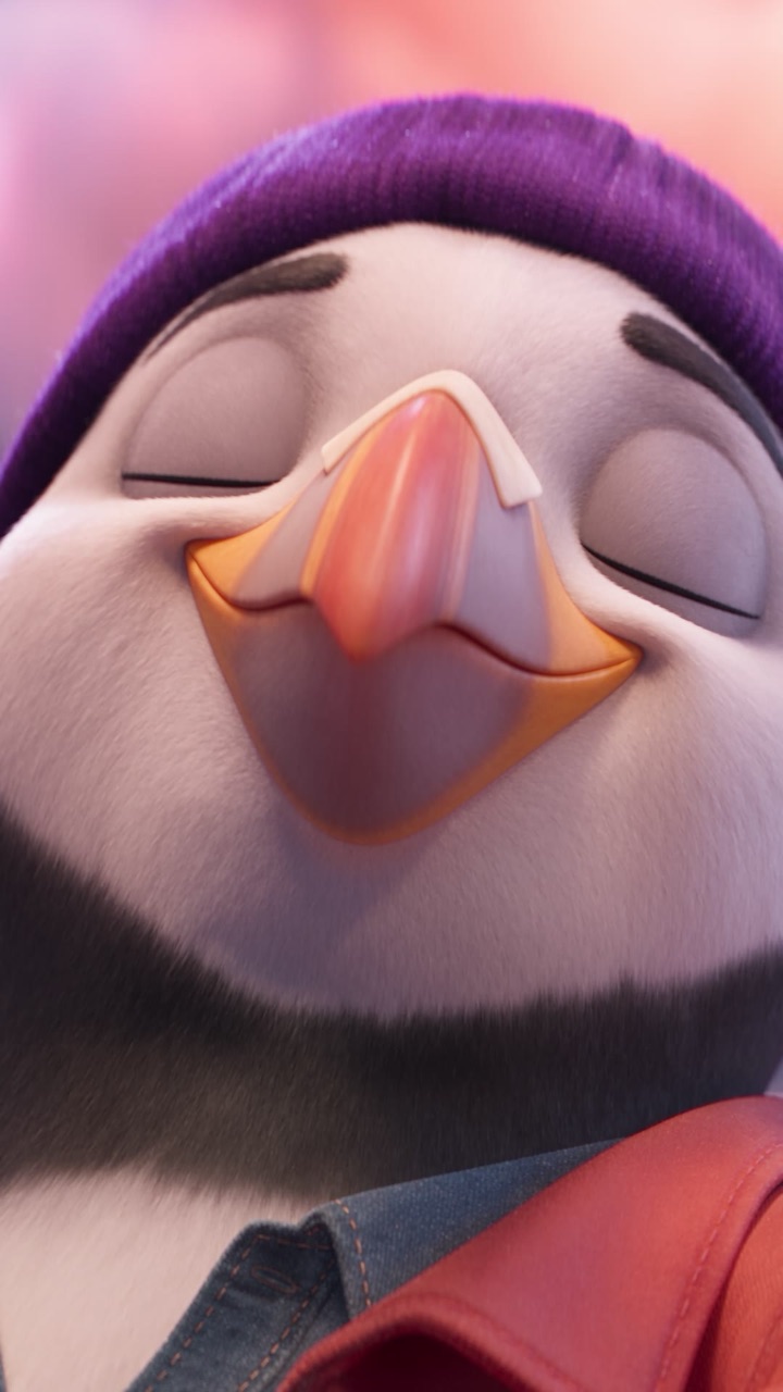 Puffin with his eyes closed, smiling blissfully