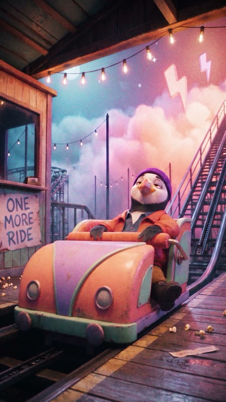 Puffin in a vintage roller coaster car next to a ONE MORE RIDE sign